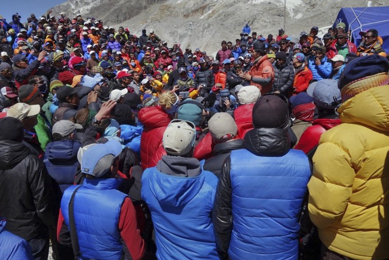 Image: A Nepalese government delegation and Sherpa mountain guides meet near Everest base camp