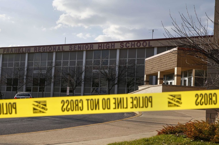 Image: Police tape is seen outside Franklin Regional High School after a series of knife attacks in Murrysville
