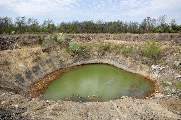 Image: A pond formed by a collapsed mine outside Picher