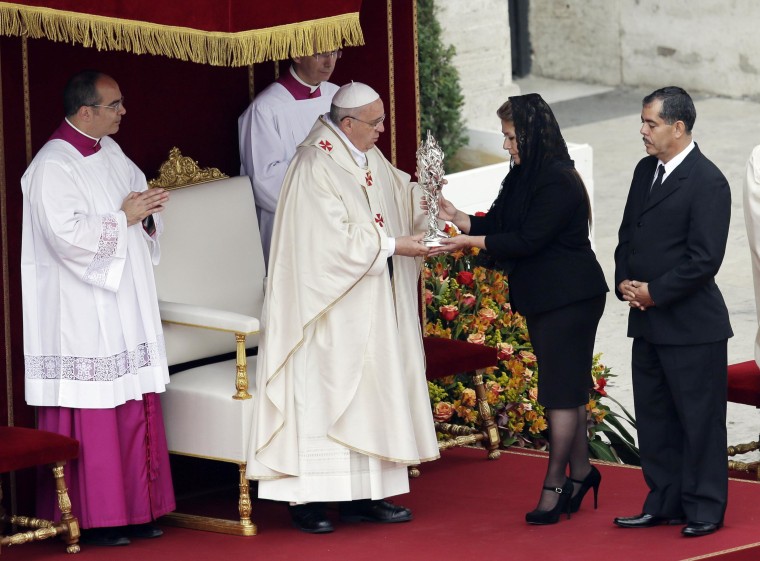 Image: Pope Francis receives the relic of Pope John Paul II from Floribeth Mora