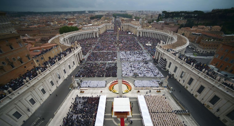 Image: The crowd gathered on St Peter's square during the canonization Mass of Popes John XXIII and John Paul II