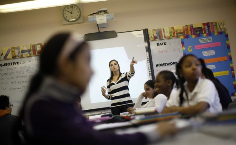 Image: Teacher Jaclyn Kruljac speaks to her students in 5th grade class at Walsh Elementary School in Chicago, Illinois