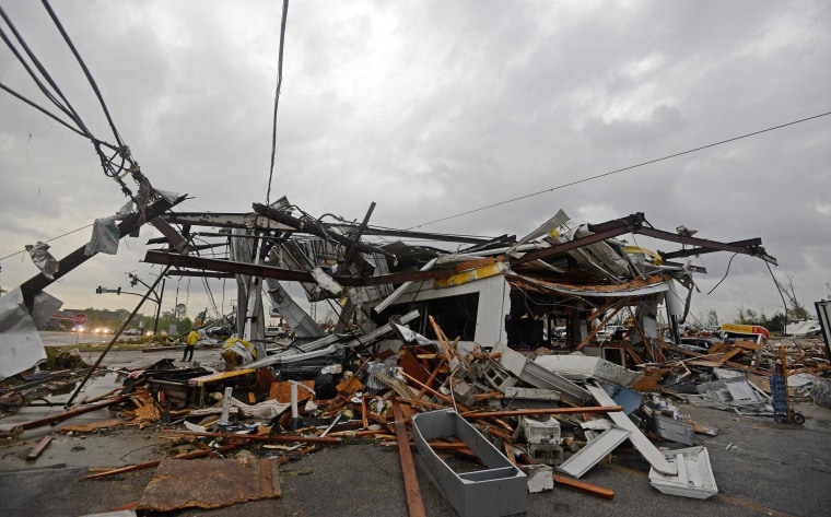 Image: Buildings are damaged along Gloucester Street after a tornado in Tupelo, Miss., on April 28.