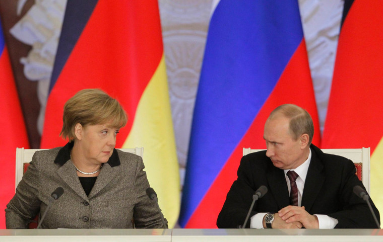 Image: German Chancellor Angela Merkel and Russian President Vladimir Putin