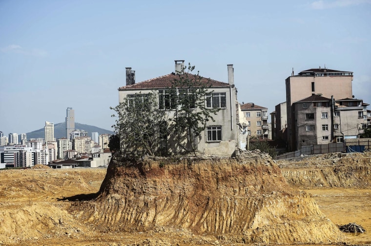 Image: A lone house stands at a construction site in the Fikirtepe district of Istanbul