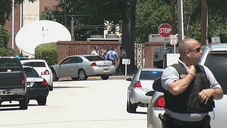 Image: Police stand near Paine College in Augusta, Ga., Monday.