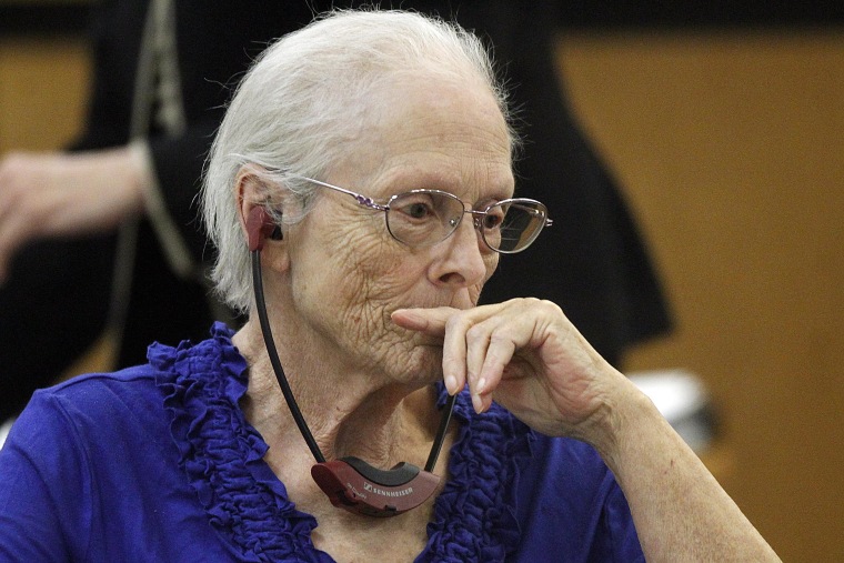 Alice Uden listens to the judge during jury selection  at the Laramie County District Court on April 29. Uden faces one count of first-degree murder for allegedly killing her husband nearly 40 years ago.