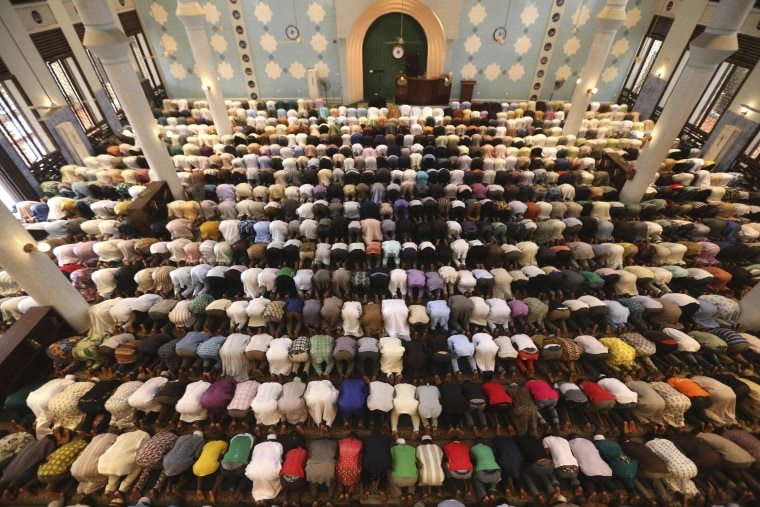 Image: Muslims pray at a Jumat service at the Lagos central mosque