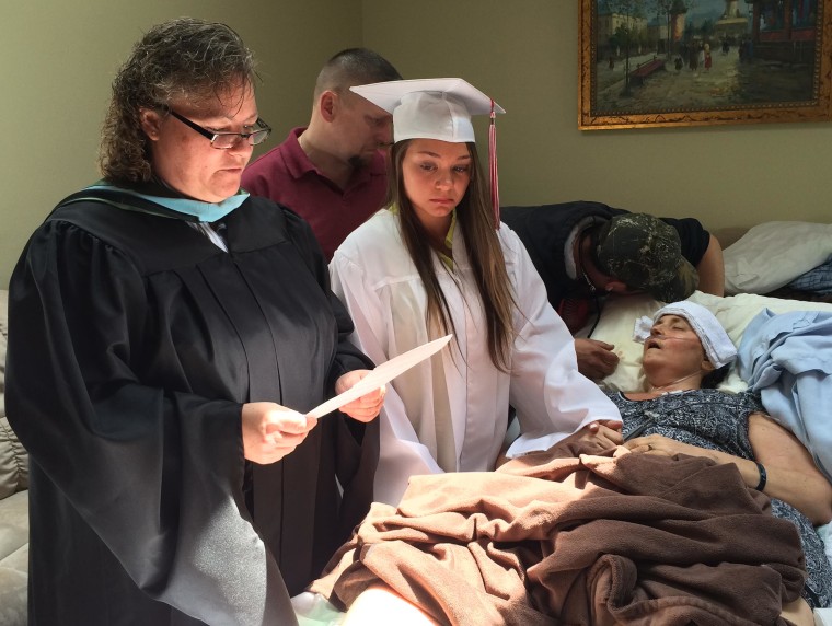 Image: Megan Sugg graduates at the bedside of her cancer-stricken mother, Darlene Sugg on Thursday.