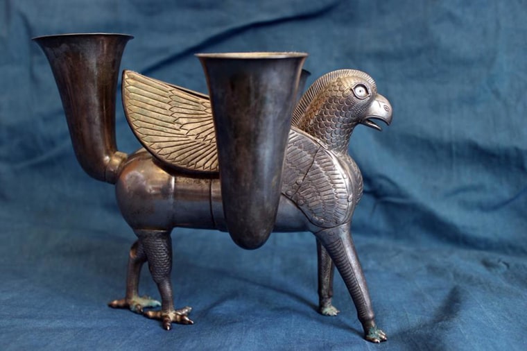 U.S. government officials handed over a silver griffin-shaped artifact to Mohammad-Ali Najafi, Iran’s Cultural Heritage Chief on Sept. 28, 2013. The Persian ceremonial drinking vessel, which dates to the 7th century B.C., was confiscated by customs officials in 2003 from an art dealer, but strained relations between the two countries prevented its return.