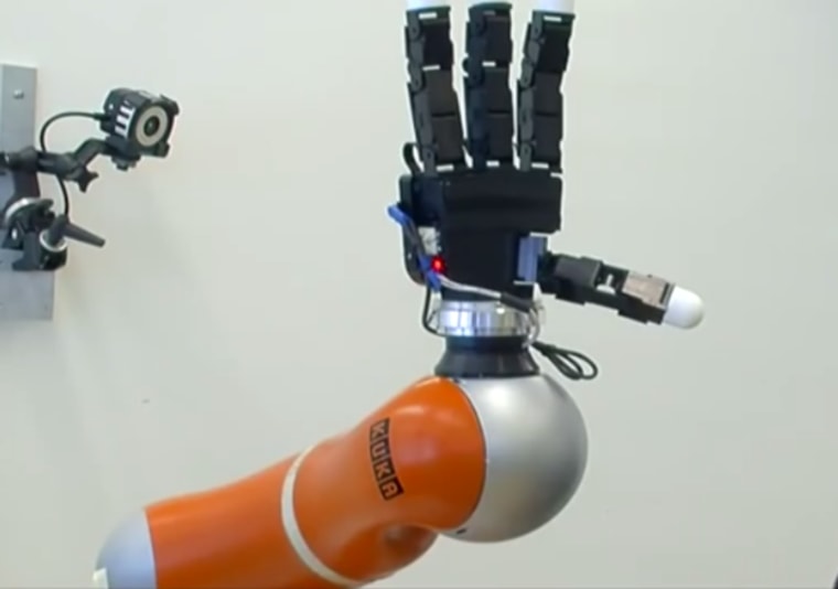 Image: Ball-catching robot arm