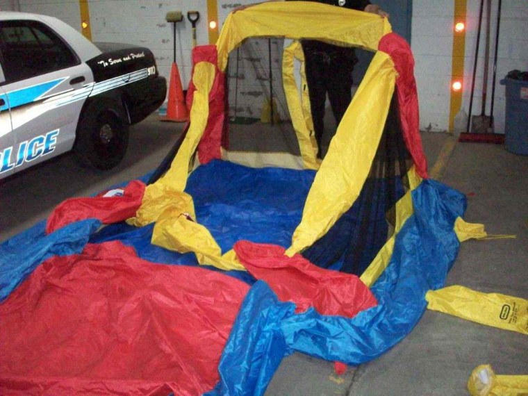 Image: The deflated bounce house that was wind-swept into the air while three children played inside in upstate New York