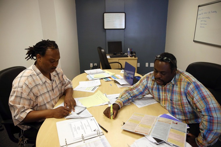 New jobless claims fell last week to a seven-year low.