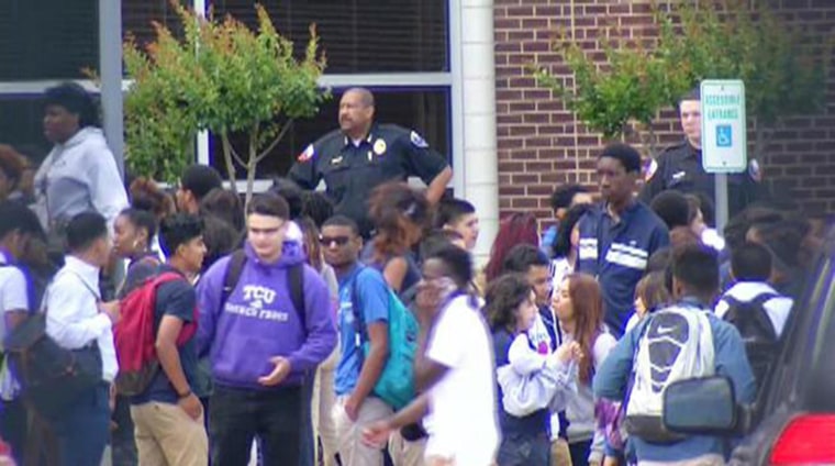 Image: More than 160 Duncanville High School students are returning to school a day after a dress code crackdown sparked outrage with students and parents