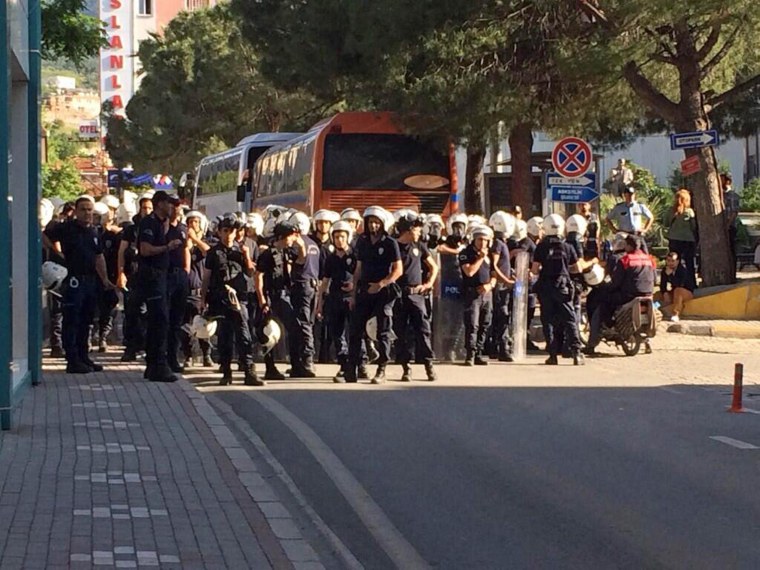 Riot police face off with protesters in Soma, Turkey, on May 16, 2014. 