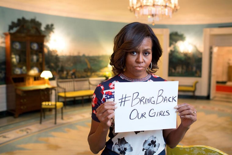 Image: First lady Michelle Obama holds a sign in support of the missing Nigerian girls