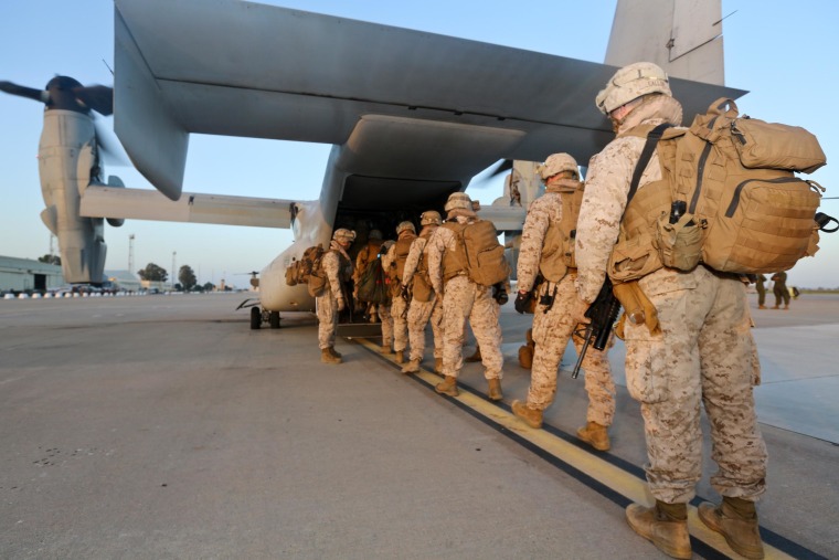 U.S. Marines board an Osprey at Moron Air Base, Spain, on May 13, heading for Naval Air Station Sigonella in Sicily in preparation to protect U.S. personnel and facilities in Northern Africa.