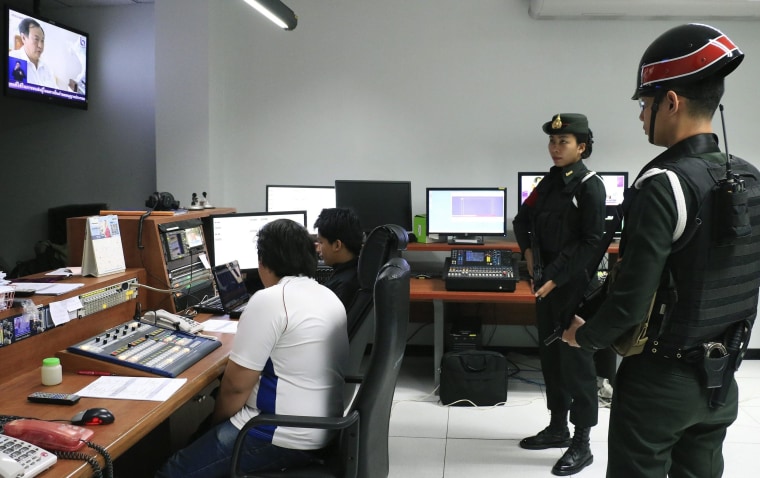 Image: Soldiers inside the control room of the offices of the National Broadcasting Services of Thailand
