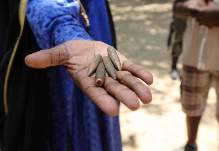 Image: A village chief in northern Cameroon showed NBC News bullets from a high-velocity rifle, which he says were found inside a nearby home.