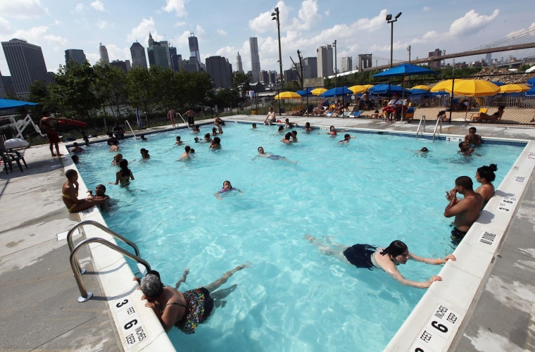 Image: Kids play in a pool in New York City