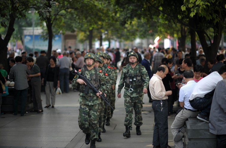 Image: China launched armed police patrols to handle violent incidents