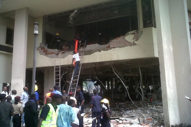 Image: Firefighters and rescue workers respond after a large explosion struck the United Nations' main office in Nigeria's capital Abuja in 2011