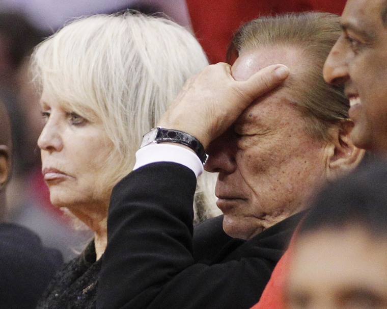 Image: File photo of Los Angeles Clippers owner Sterling putting his hand over his face in the second half of an NBA basketball game in Los Angeles
