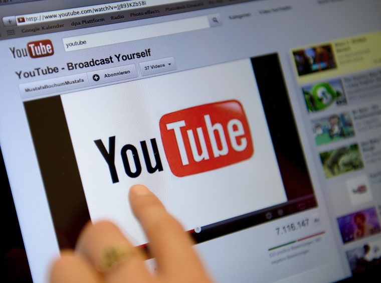 Image: A person views a video on the YouTube website