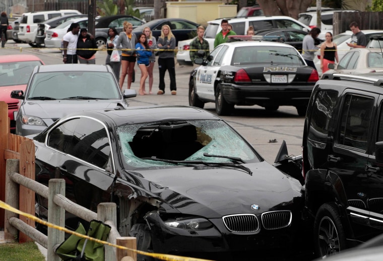 Image: The vehicle of the alleged shooter is pictured at one of the crime scenes after a series of drive-by shootings in the Isla Vista section of Santa Barbara