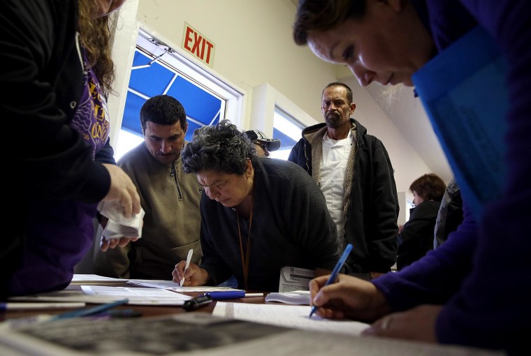 Image: Americans Register For Health Care On Final Day of ACA Enrollment Drive
