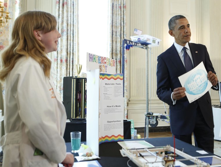 U.S. President Obama holds a design at a White House Science Fair at the White House in Washington