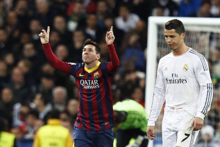 Cristiano Ronaldo (R) and Lionel Messi (L) are the faces of the Nike-Adidas soccer marketing rivalry.