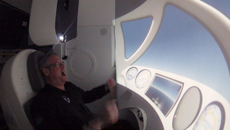 Image: Ian Bailey reacts as the NASTAR centrifuge accelerates to simulate the rocket ride aboard Virgin Galactic's SpaceShipTwo rocket plane.