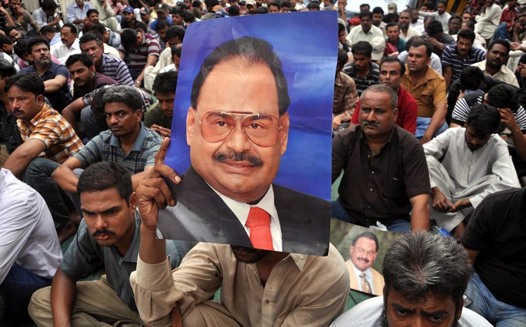 Image: Supporters of Pakistani opposition party Mutahida Qaumi Movement (MQM) listen to a speech by party leader Altaf Hussain