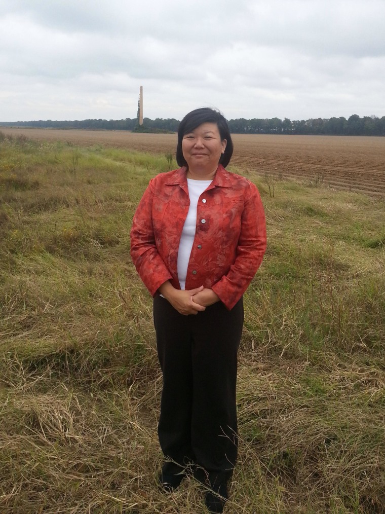 Lisa Hasegawa stands at the former site of the Jerome, Arkansas internment camp, where her family was held.