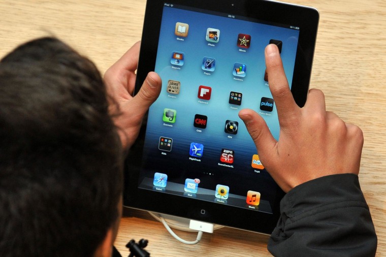 Image: A child n using an iPad