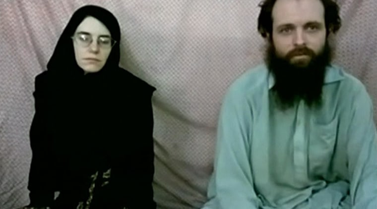 Image: Caitlan Coleman and Joshua Boyle are seen in a still from a video made by the Taliban.