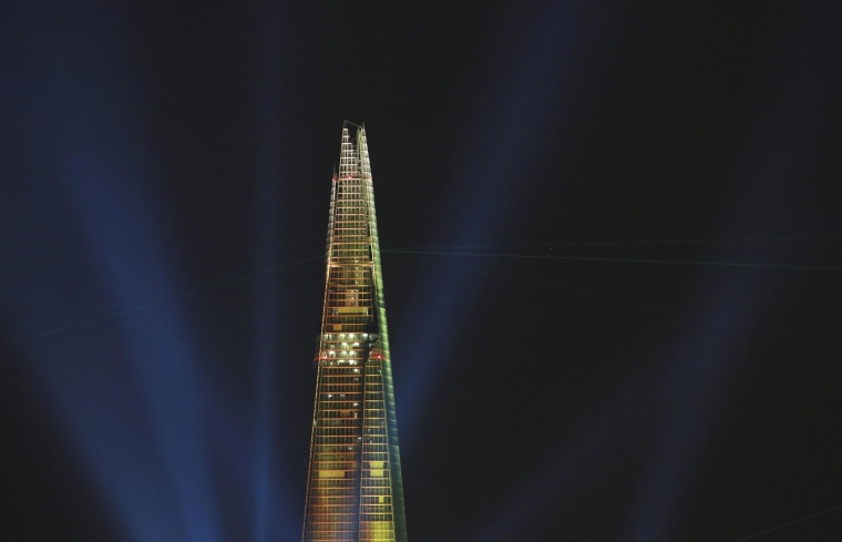 Laser beams are seen at the Shard during the laser and searchlight show which marks the completion of the exterior of the Shard building in central London