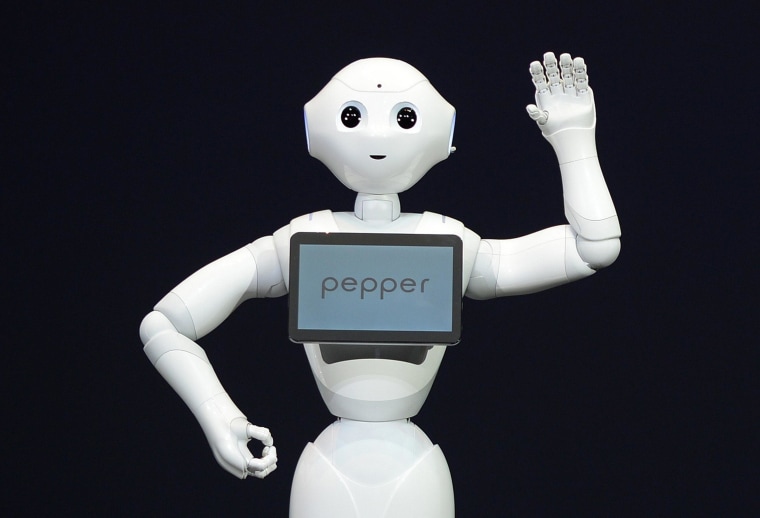 Image: Humanoid robot 'Pepper', equipped with an emotion engine, 'speaks' during a press conference