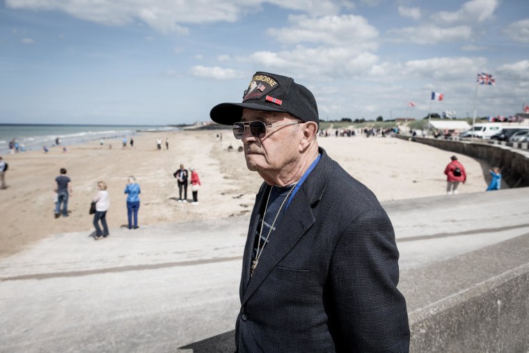 Image: U.S. veteran John Cipolla looks out onto Gold Beach in Normandy.