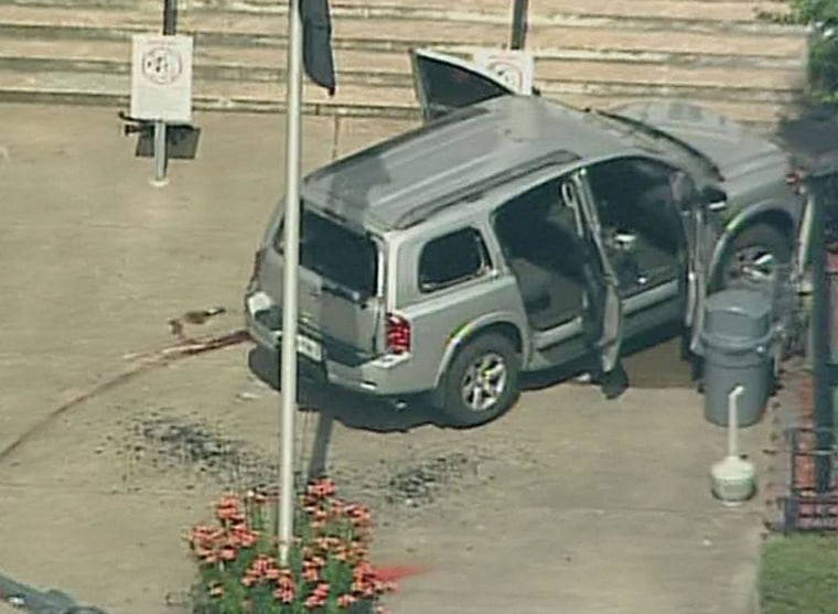 The scene of a shooting outside the Forsyth County Courthouse in Cumming, Ga.