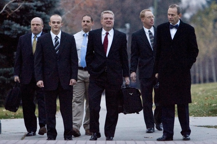 Image: Former Blackwater Worldwide security guards arrive at the U.S. District Court in Salt Lake City