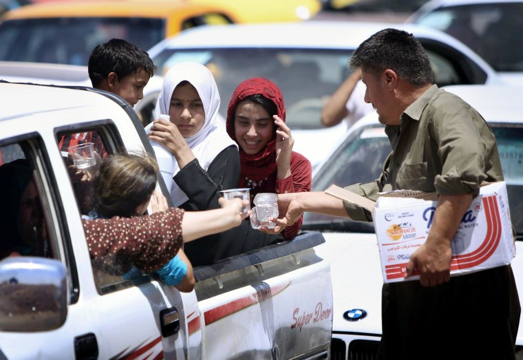 Image: Iraqi families fleeing violence