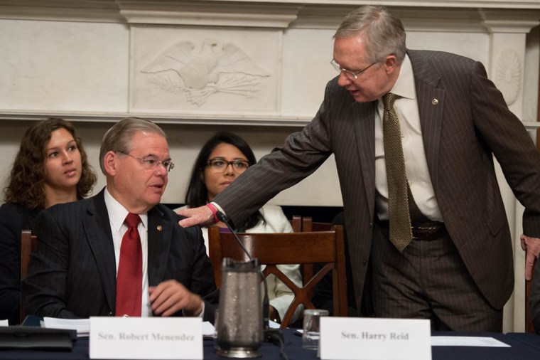 Sen. Robert Menendez, left, and Senate Majority Leader Harry Reid