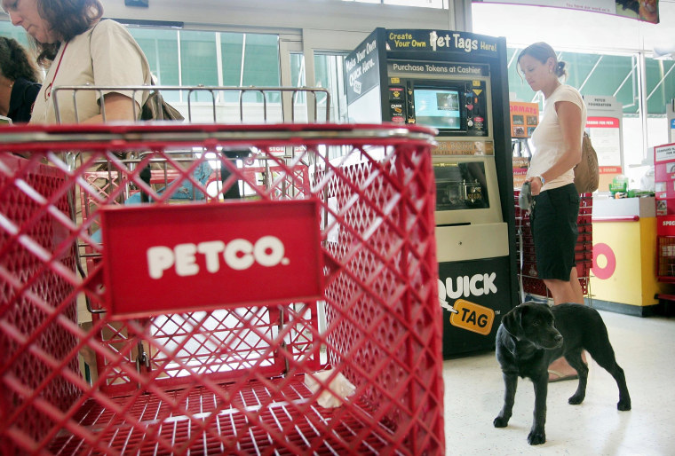 Image: Shoppers look over the merchandise at a PetCo store on July 14, 2006 in Chicago, Ill.
