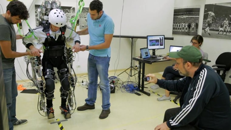 Image: Brazilian neuroscientist Dr Miguel Nicolelis works on the Walk Again Project