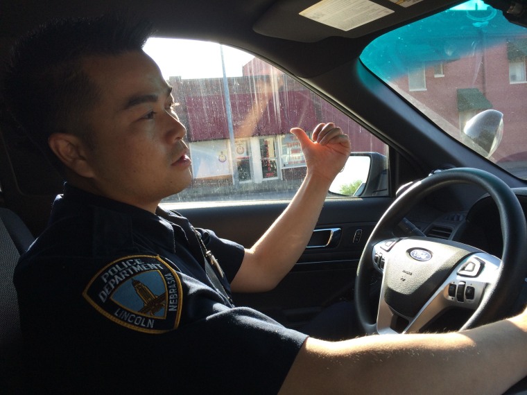 Officer Tu Tran on patrol in Lincoln, Nebraska.