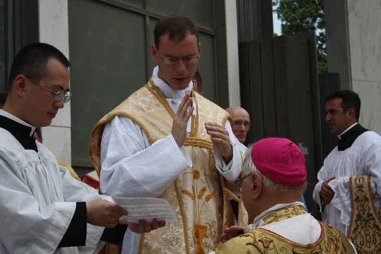 Image: Fr. Kenneth Walker, 28, is seen on his ordination day on May 19, 2012