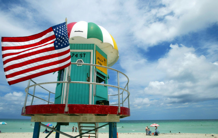 The average American plans to lay out about $1,900 for a family getaway this summer, a CNBC survey shows.