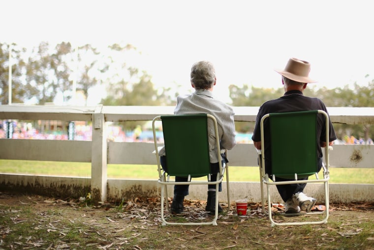 Image:  A older couple look on in Nowra, Australia  on September 22, 2013.